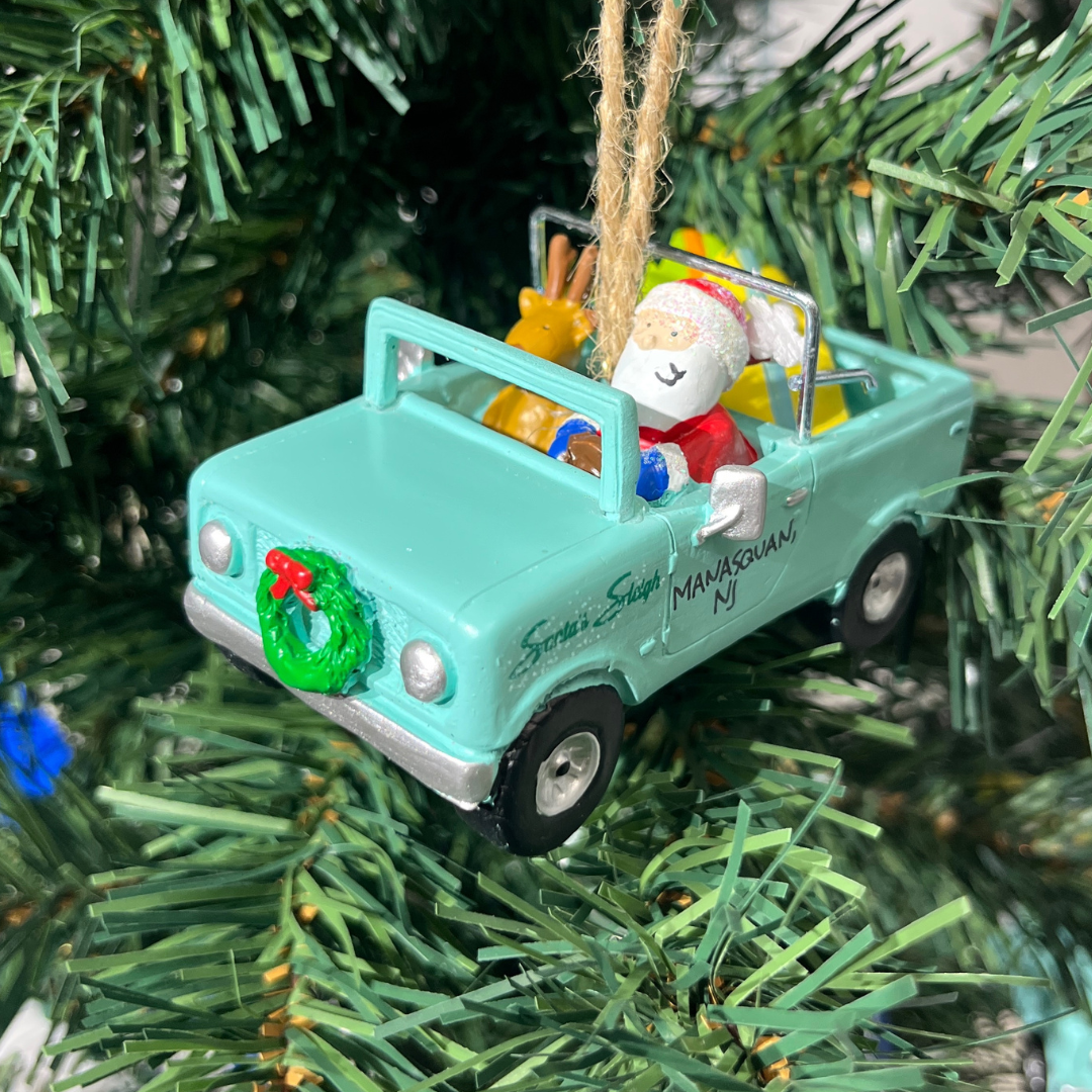 Santa in a Bronco Christmas Ornament